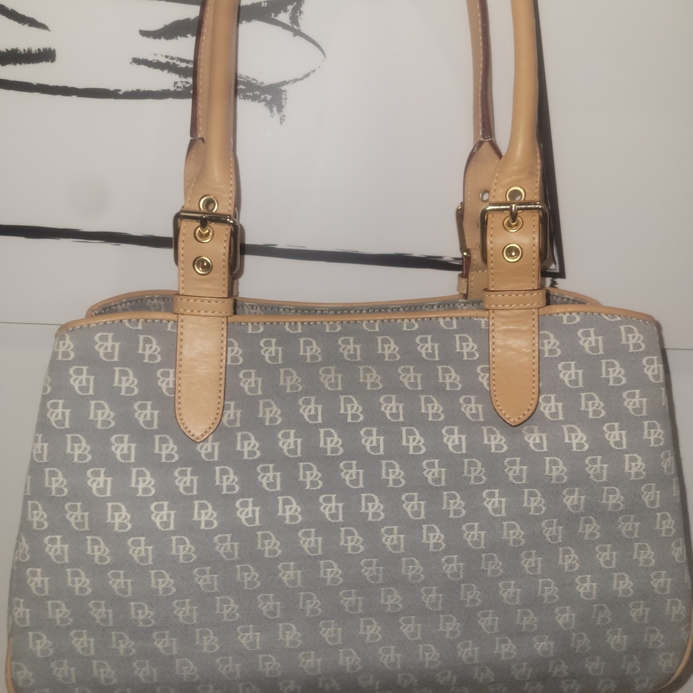 Brand: Dooney & Bourke
Style: Signature DB monogram Stylish Gray and Tan Handbag